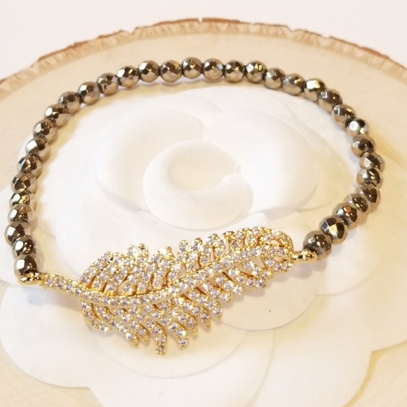 Jewelry - NEW Gold Feather Pave CZ Hematite Stretch Bracelet